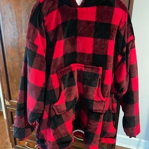 Women’s warm and cozy Huggle hoodie. One size